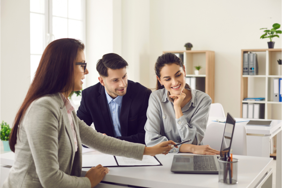 Family meeting with insurance advisor during annual insurance review